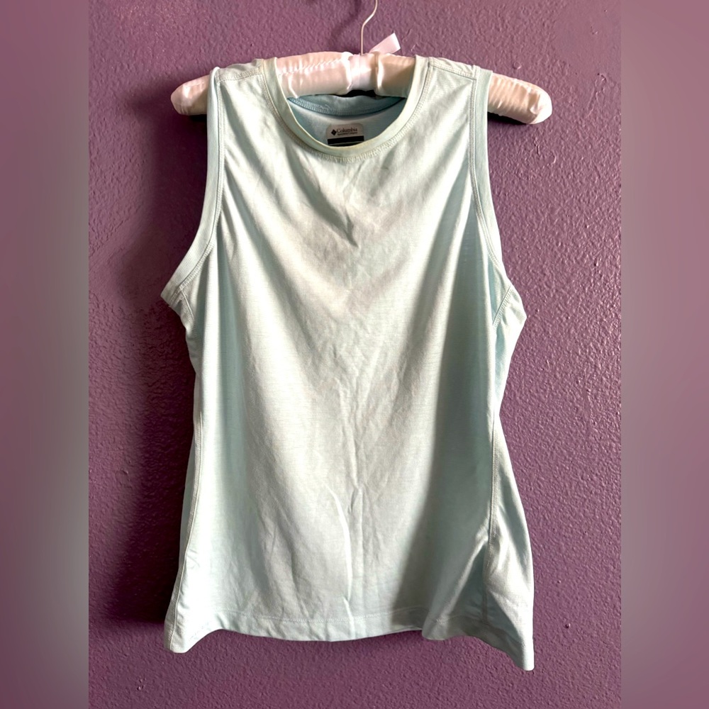 Light green/blue athletic shirt . Colombia size large